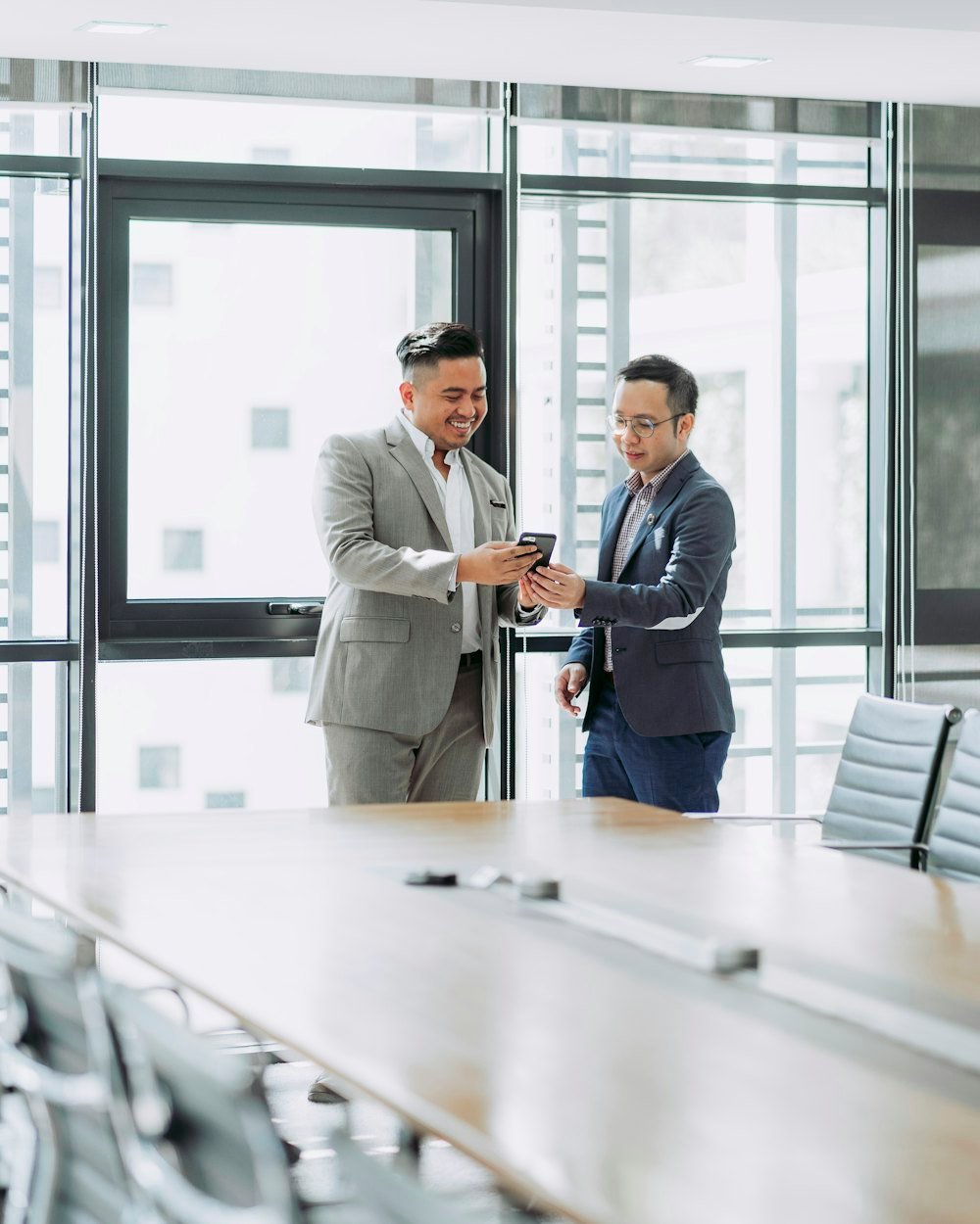 Executives shaking hands after a meeting